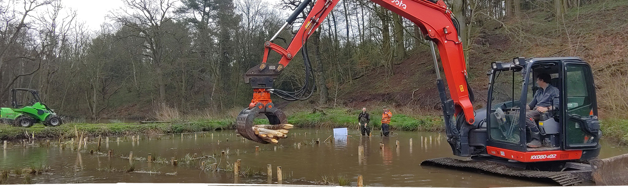 Pond clearance using digger