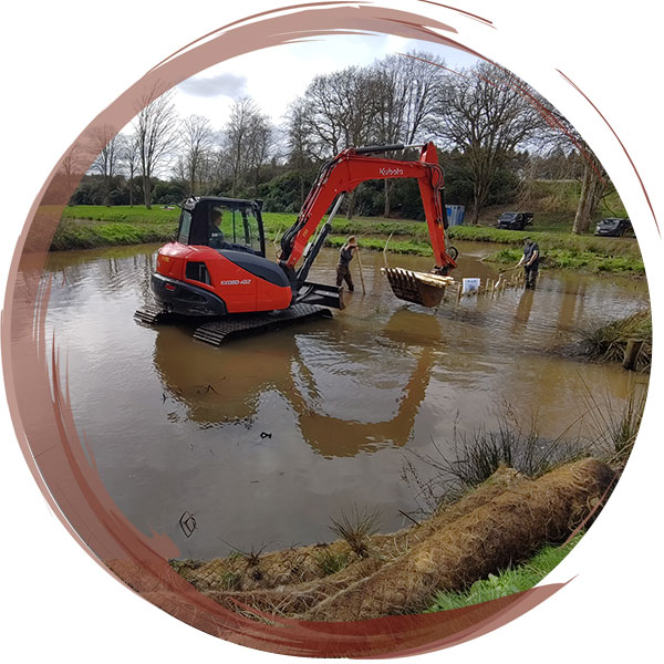 Installation of pre-planted, coir logs in a serpentine shape to encourage vegetation to grow throughout the pool and slow the flow of the river for Shropshire Wildlife Trust