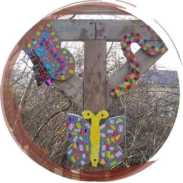 Wild art at Wooldale Junior School; pupils decorated wildlife shapes for their new outdoor classroom
